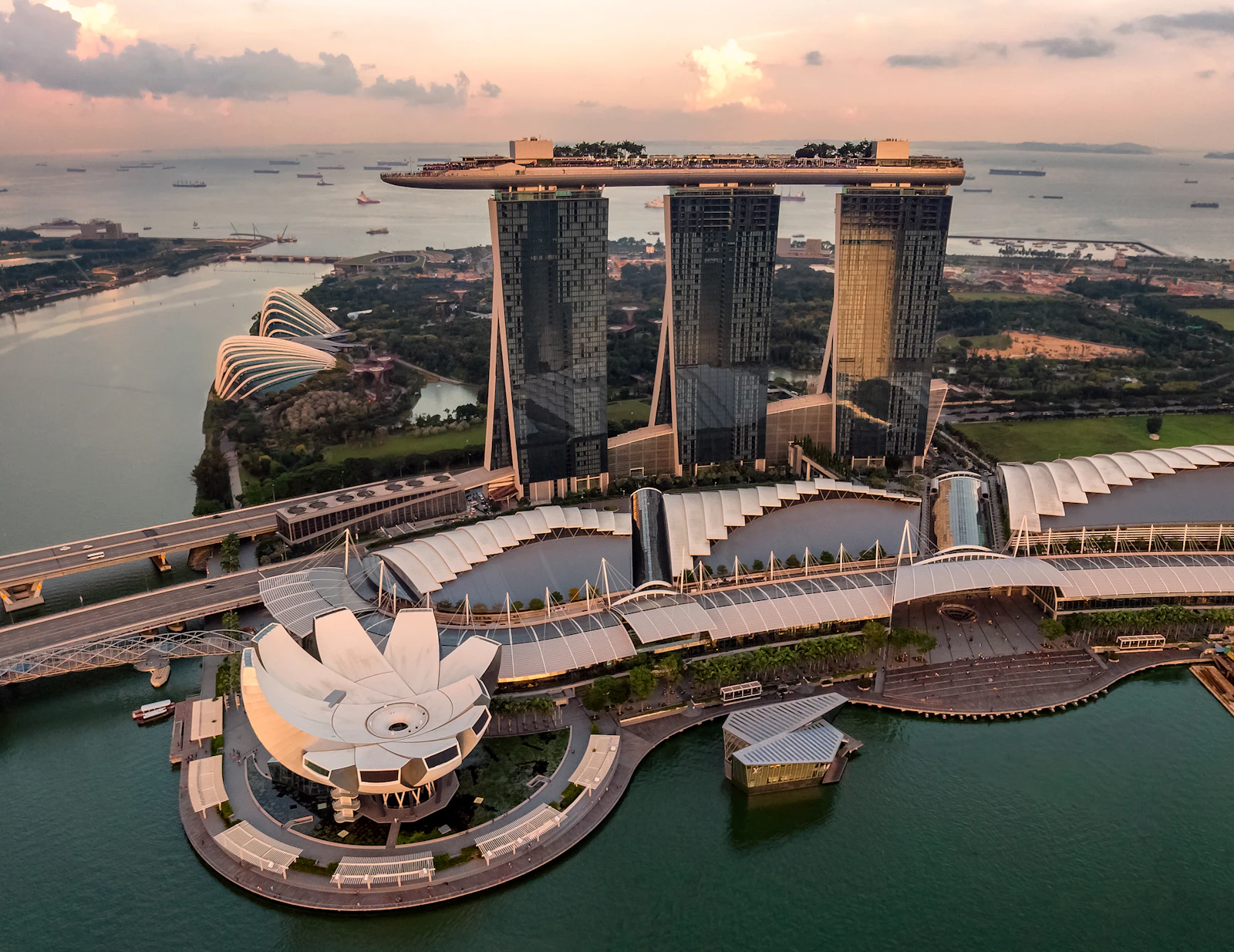 Singapore skyline at sunset with Marina Bay Sands and cityscape